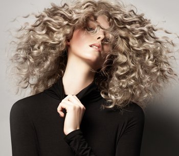 keep curls & frizz under control at KAM hair salon in Elgin